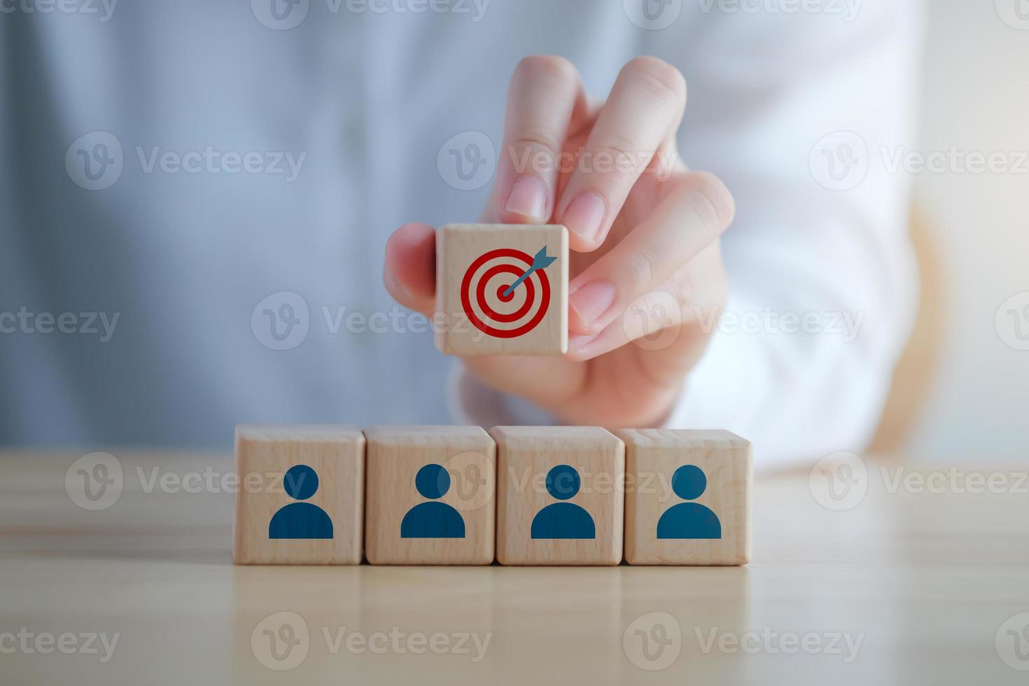 Teamwork. Successful team. Business achievement goal and objective target. Team growing business success concept. Teamwork with team businessman on wooden block and hand holding dartboards target. photo