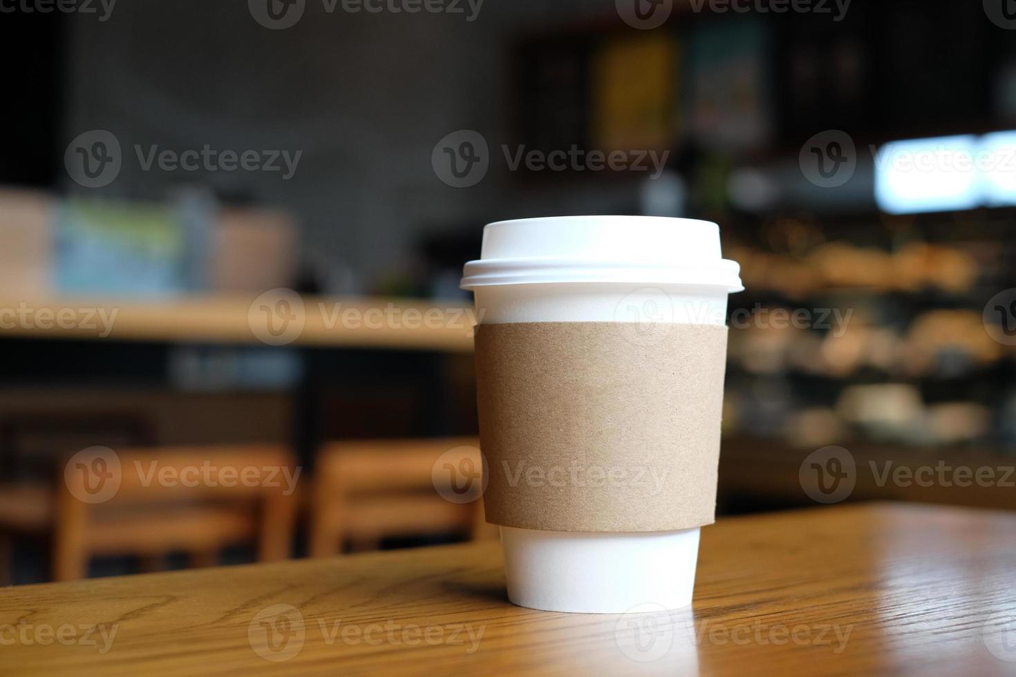 hot drink on wood table in coffee cafe. photo