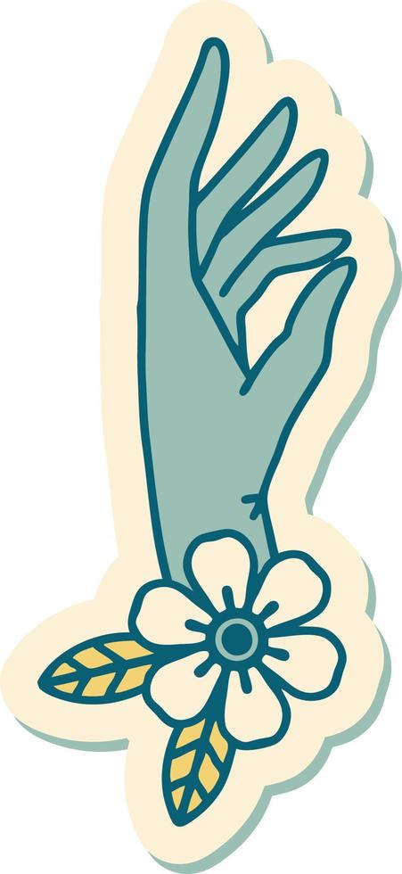 sticker of tattoo in traditional style of a hand and flower vector