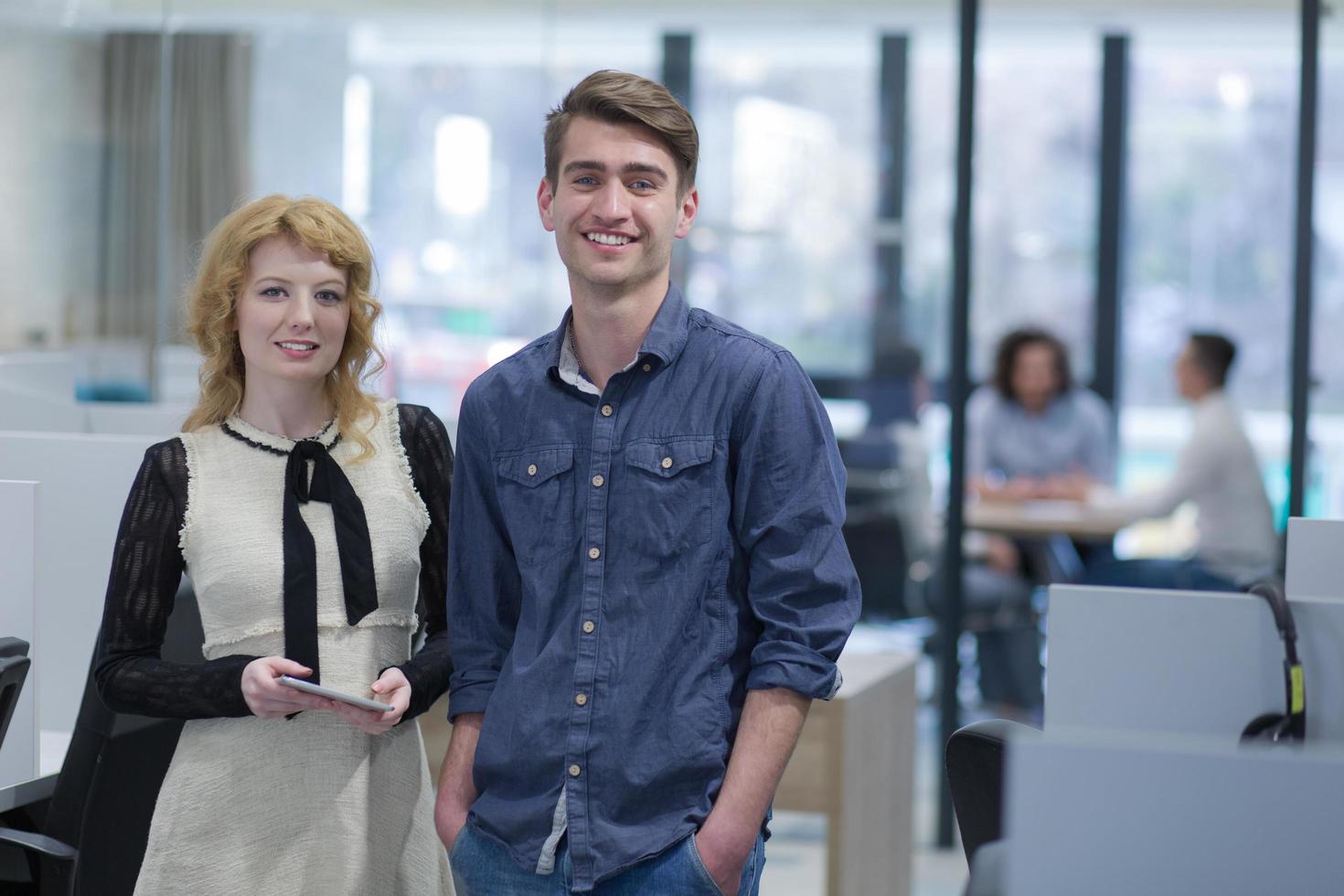 Business People Working With Tablet in startup office photo