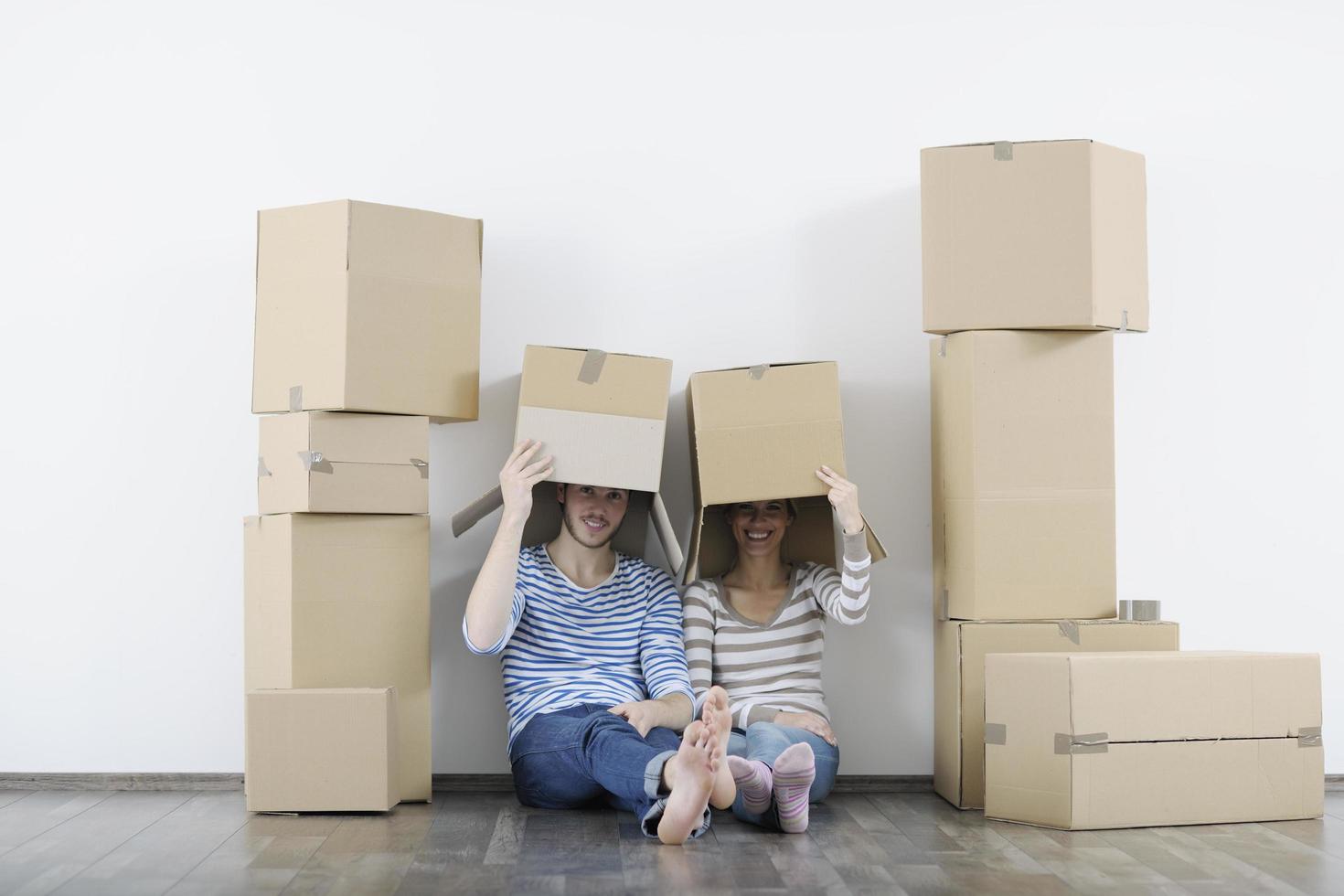 Young couple moving in new home photo