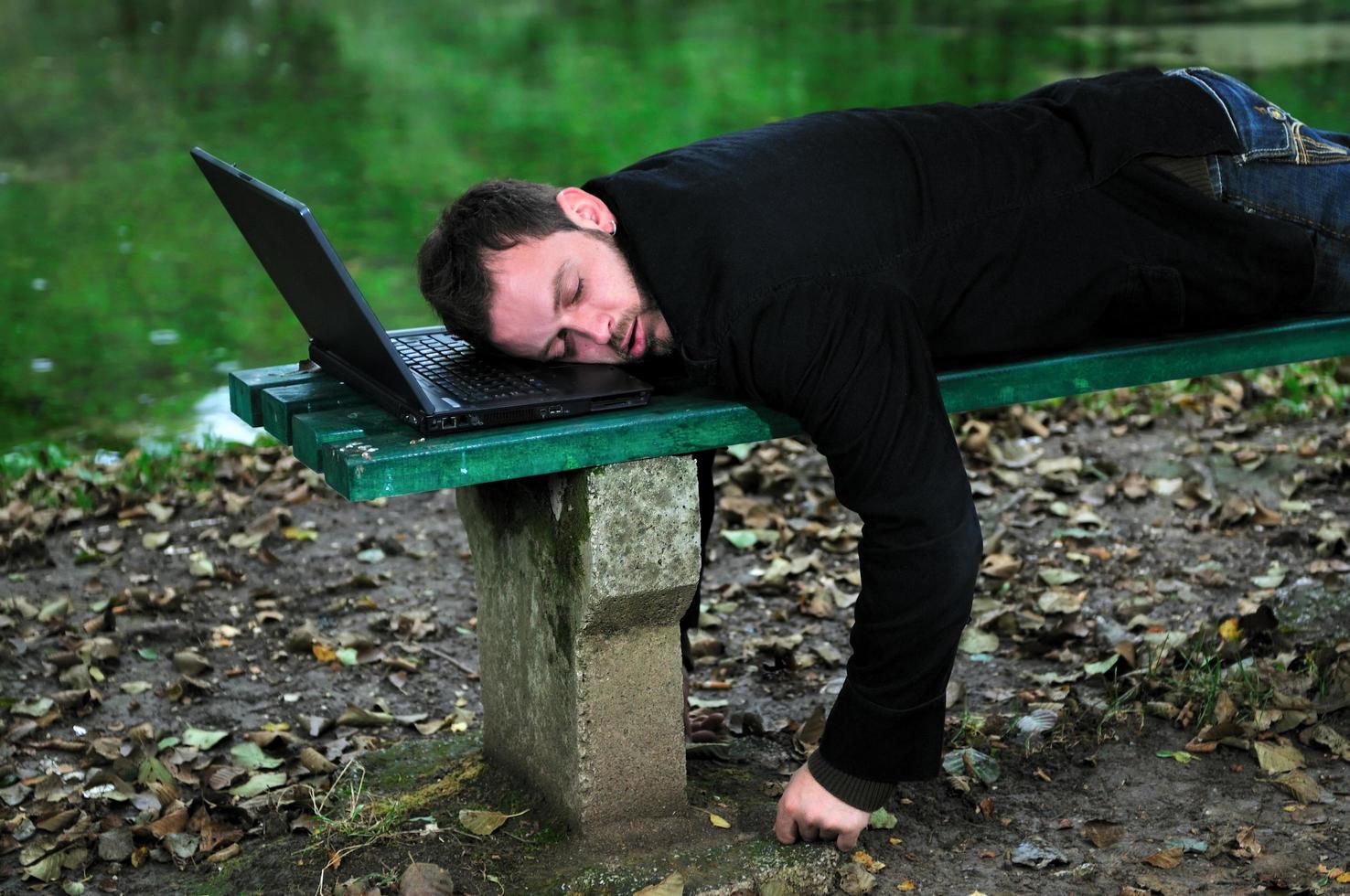 sleeping businessman outdoor photo