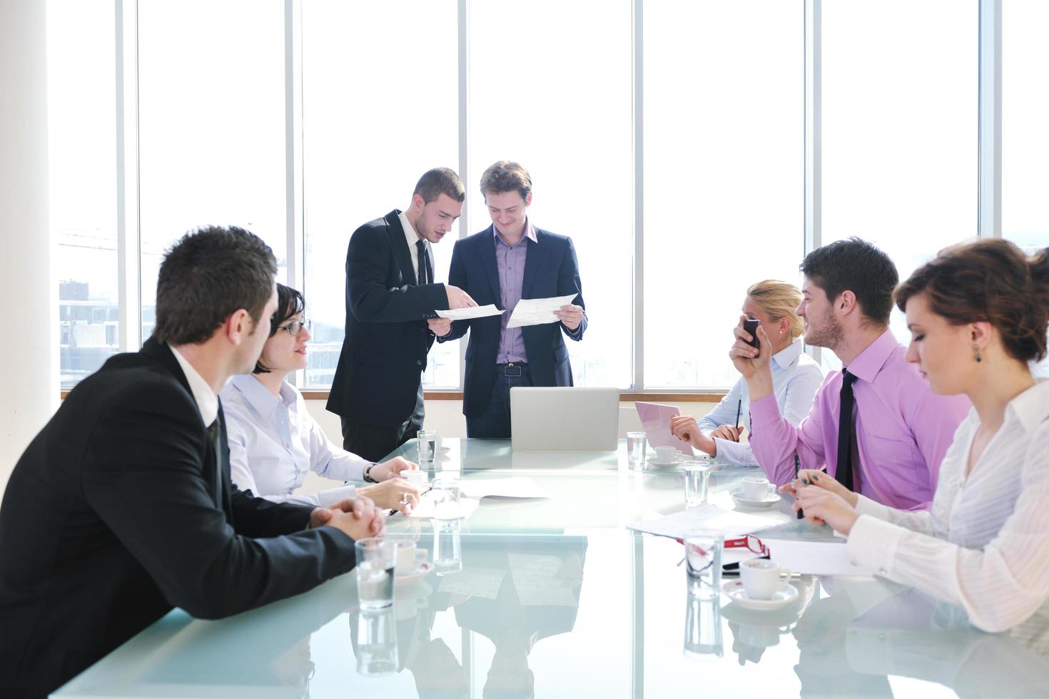 group of business people at meeting photo