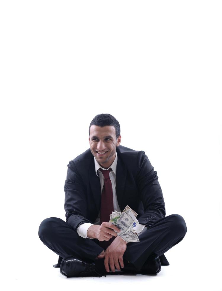 Business man holding money photo