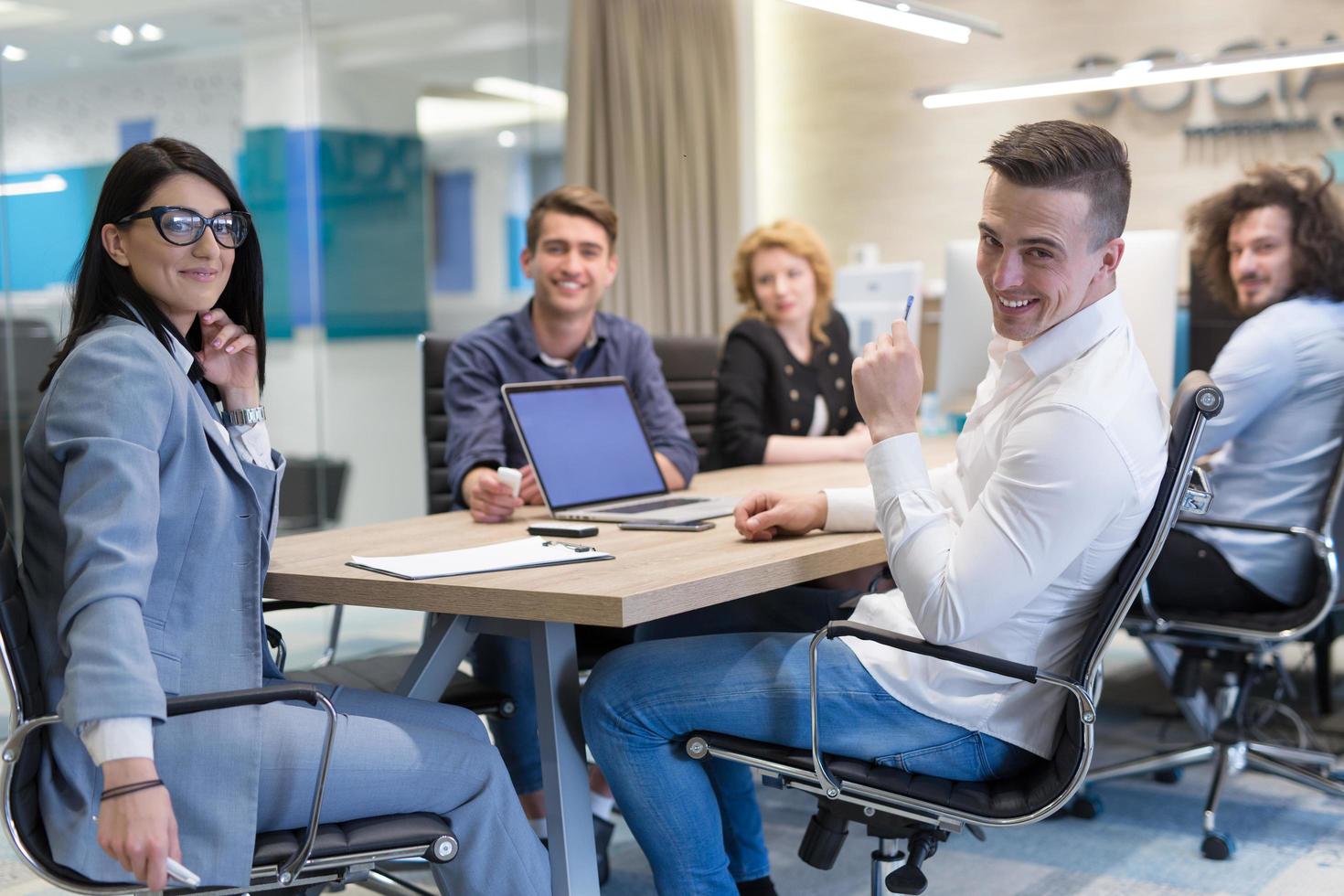 Startup Business Team At A Meeting at modern office building photo