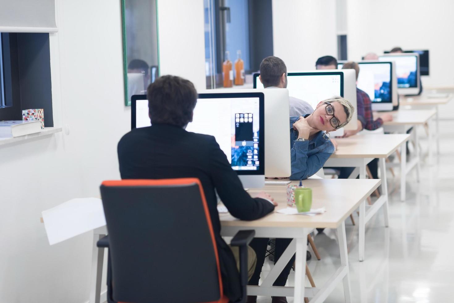 startup business, woman  working on desktop computer photo