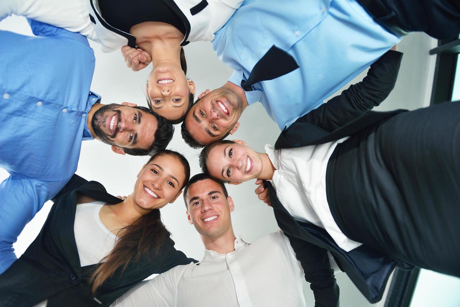 business people with their heads together 12089910 Stock Photo at Vecteezy