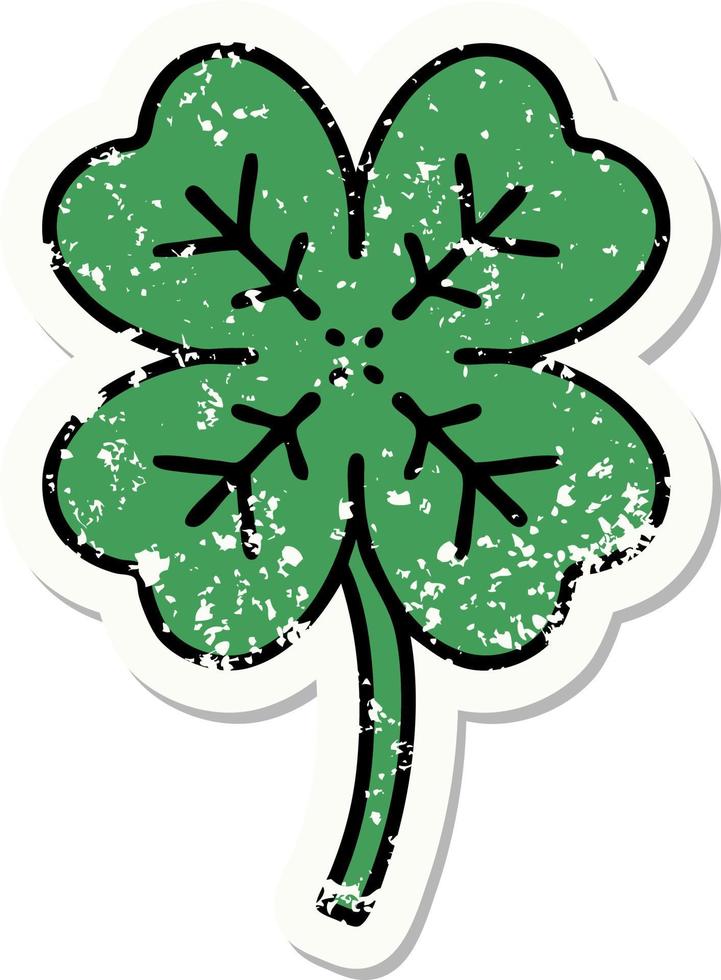 distressed sticker tattoo in traditional style of a 4 leaf clover vector