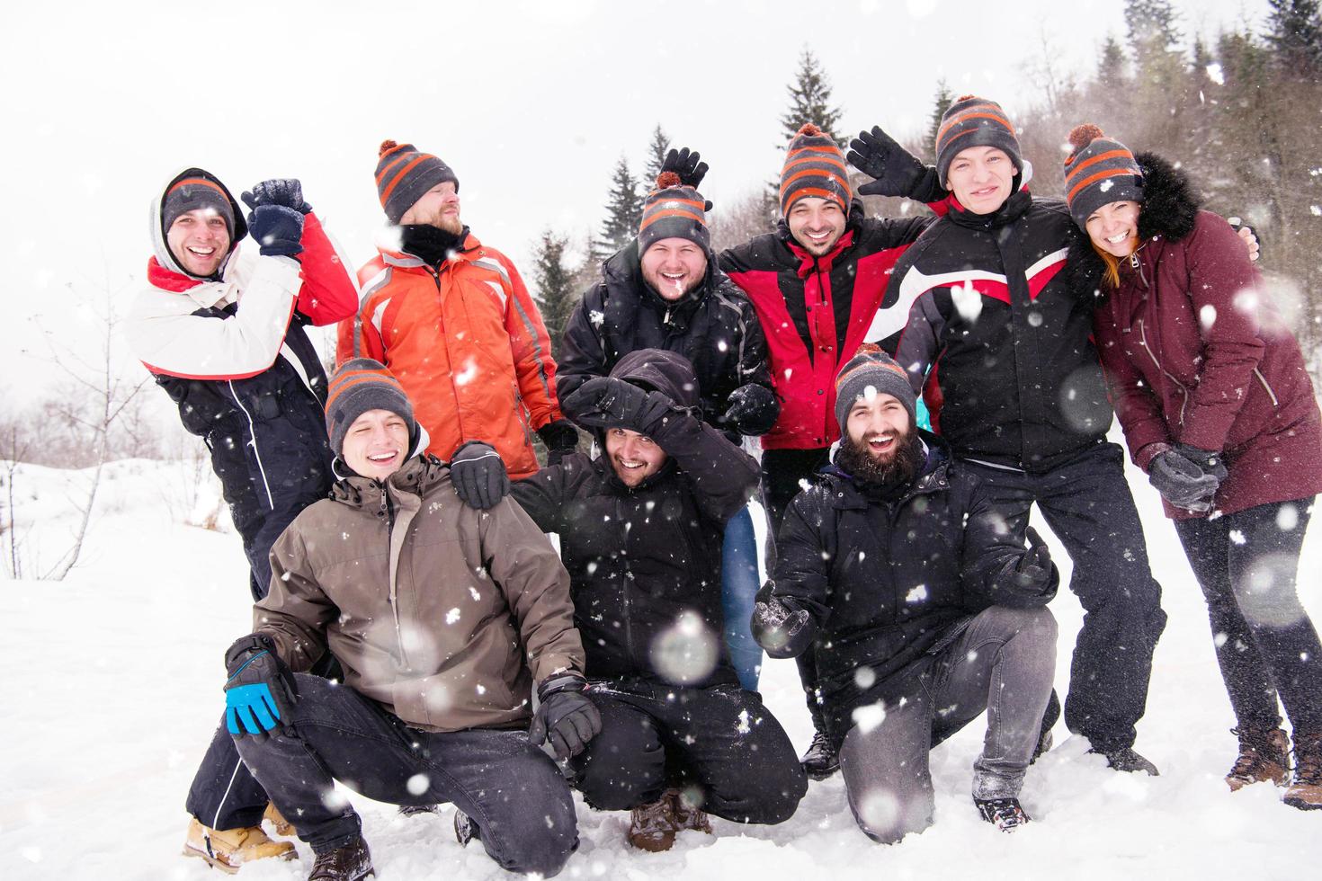 portrait of group young people in beautiful winter landscape photo