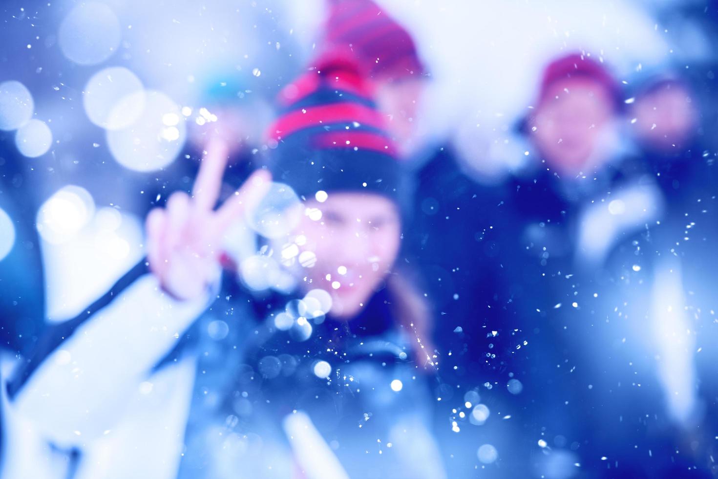 Abstract blurred photo of young woman in beautiful winter landscape
