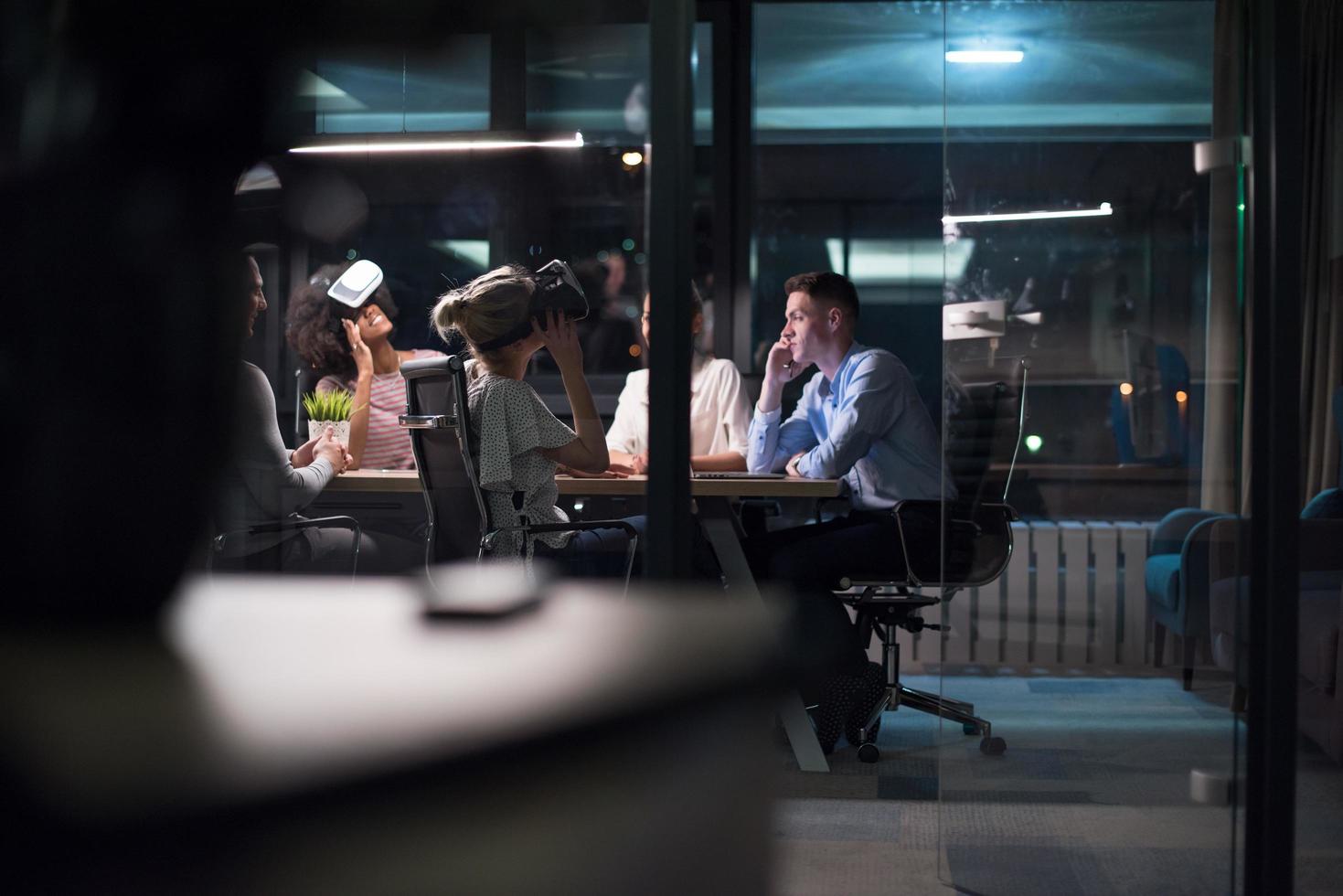 Multiethnic Business team using virtual reality headset photo