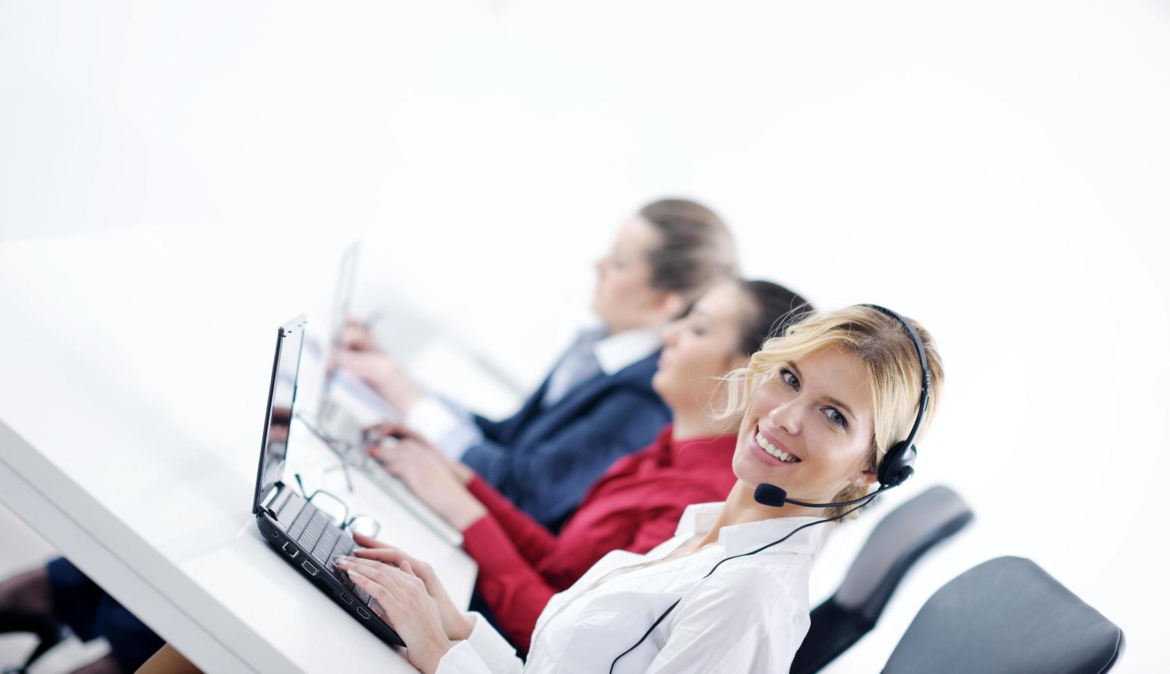 business woman group with headphones photo