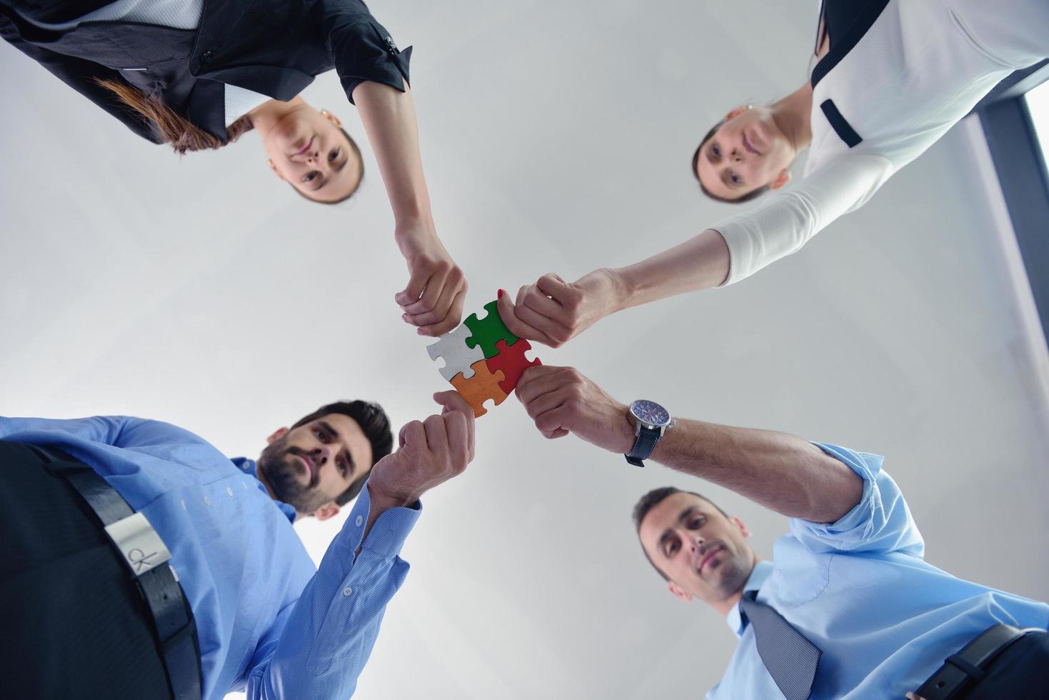 business people group joining hands photo