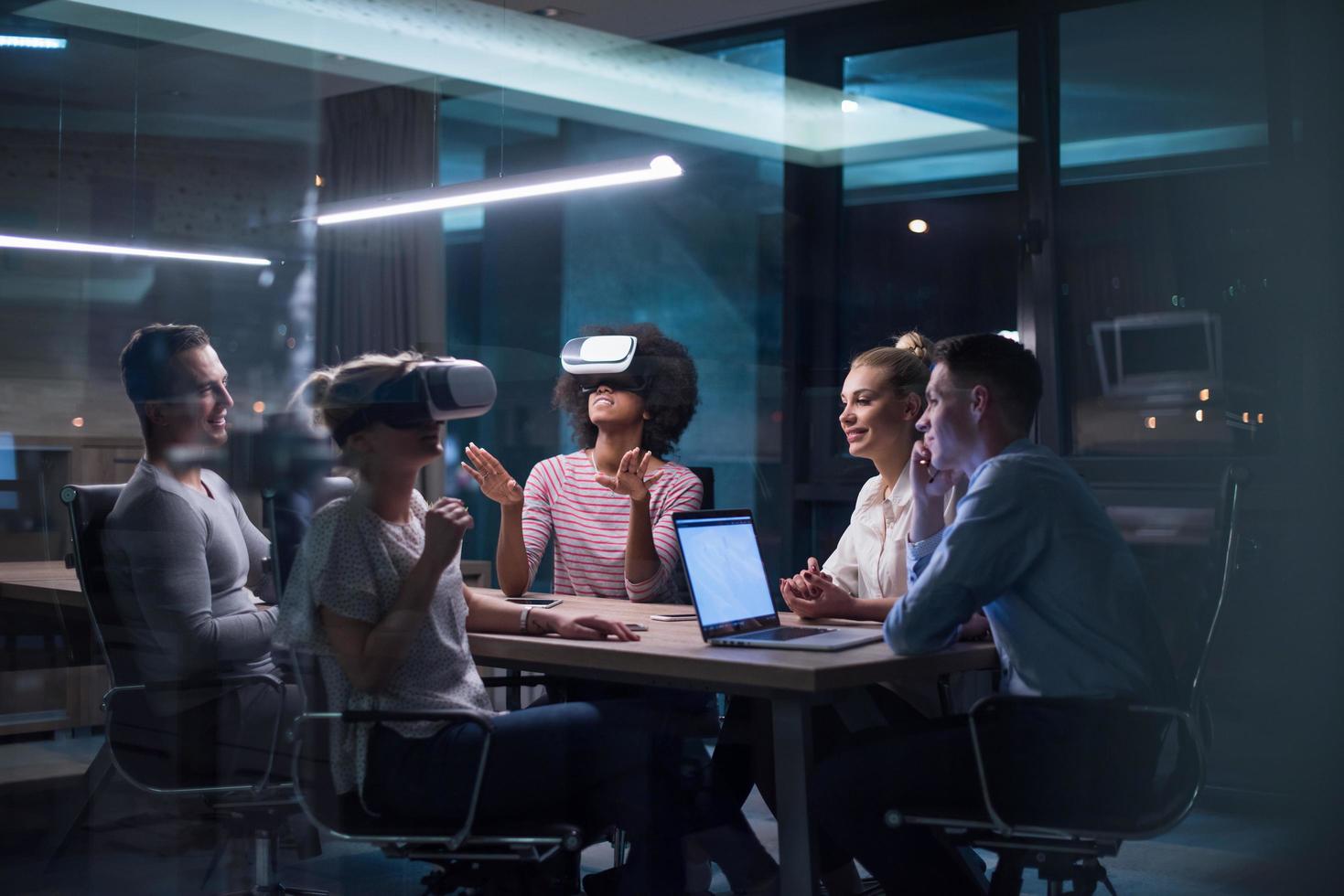 Multiethnic Business team using virtual reality headset photo