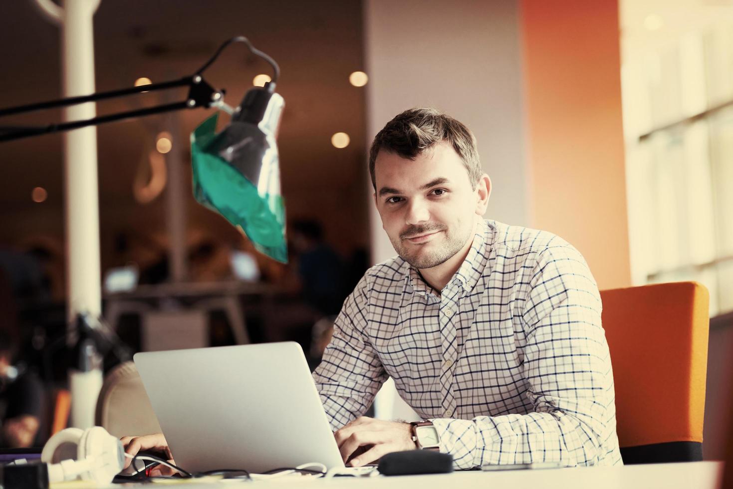 startup business, software developer working on computer photo