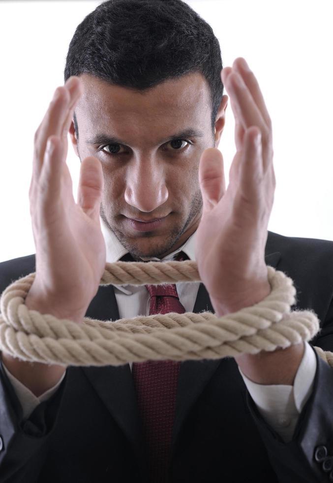 business man with rope isolated on white background photo