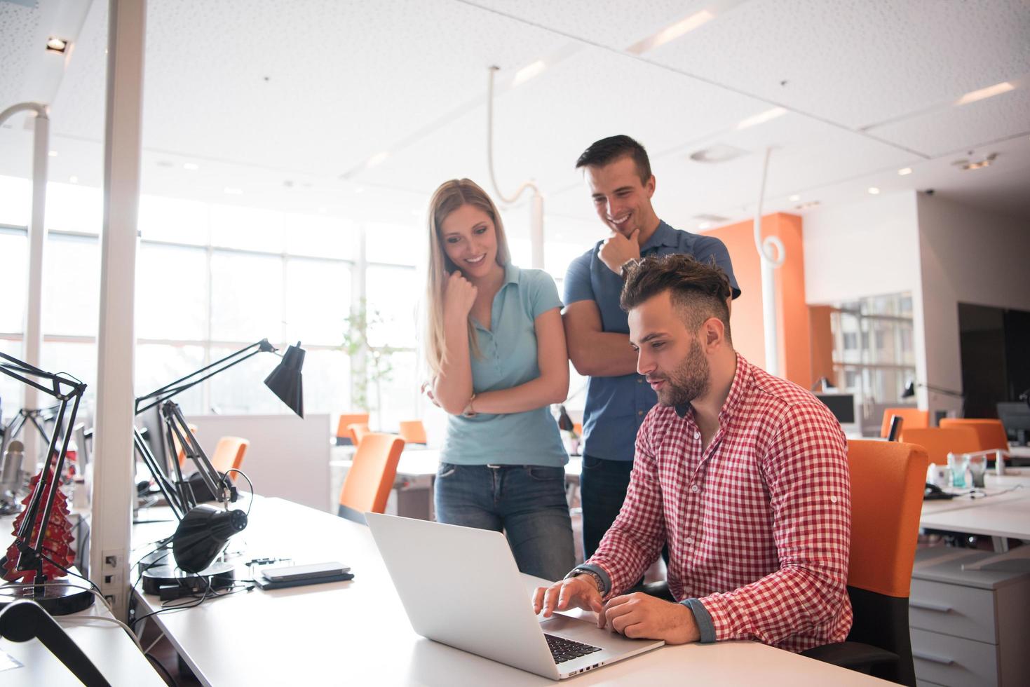 Group of young people employee workers with computer photo