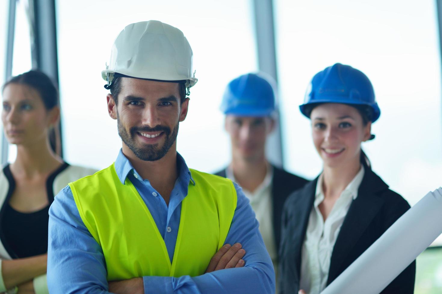 business people and engineers on meeting photo