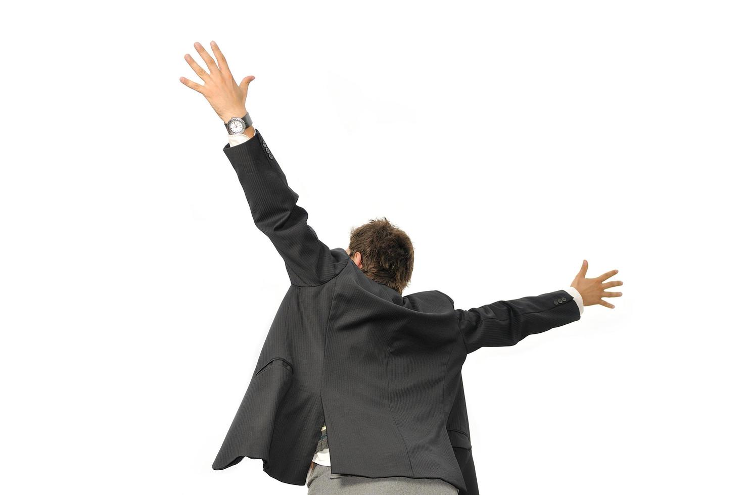 Outdoor portrait of young and happy  businessman photo