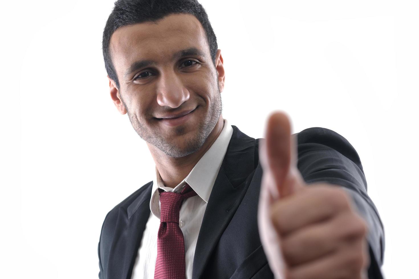 Businessmen making his thumb up saying OK photo