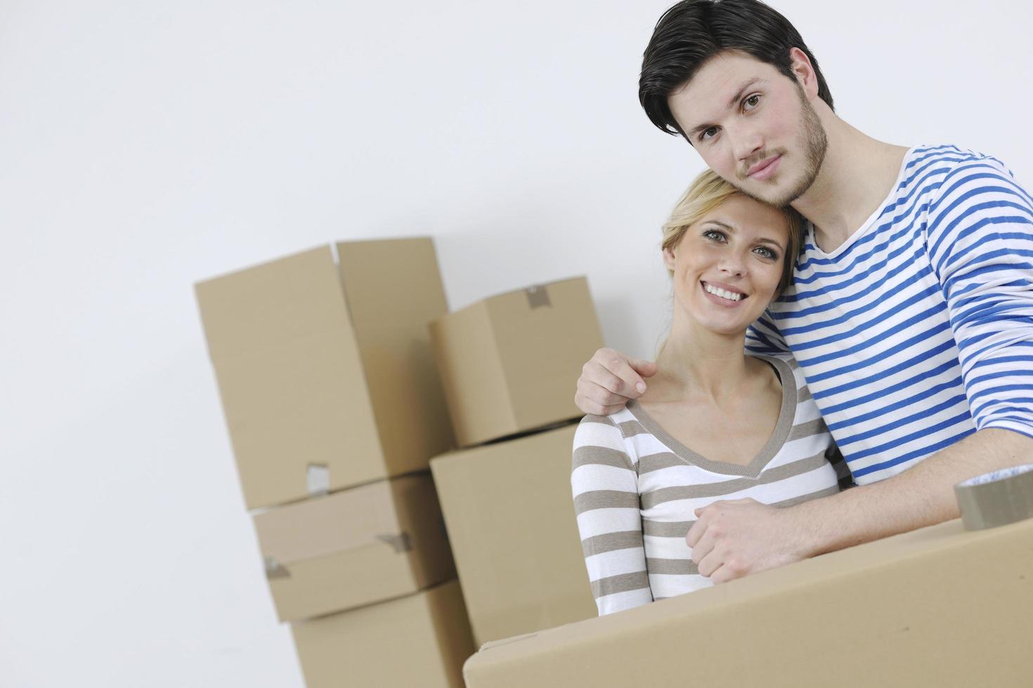 Young couple moving in new home photo
