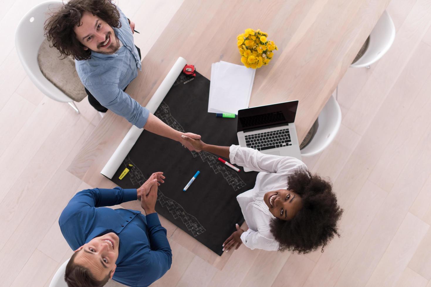 top view of Multiethnic startup business team on meeting photo