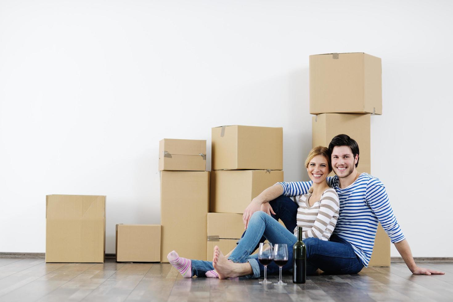 Young couple moving in new house photo