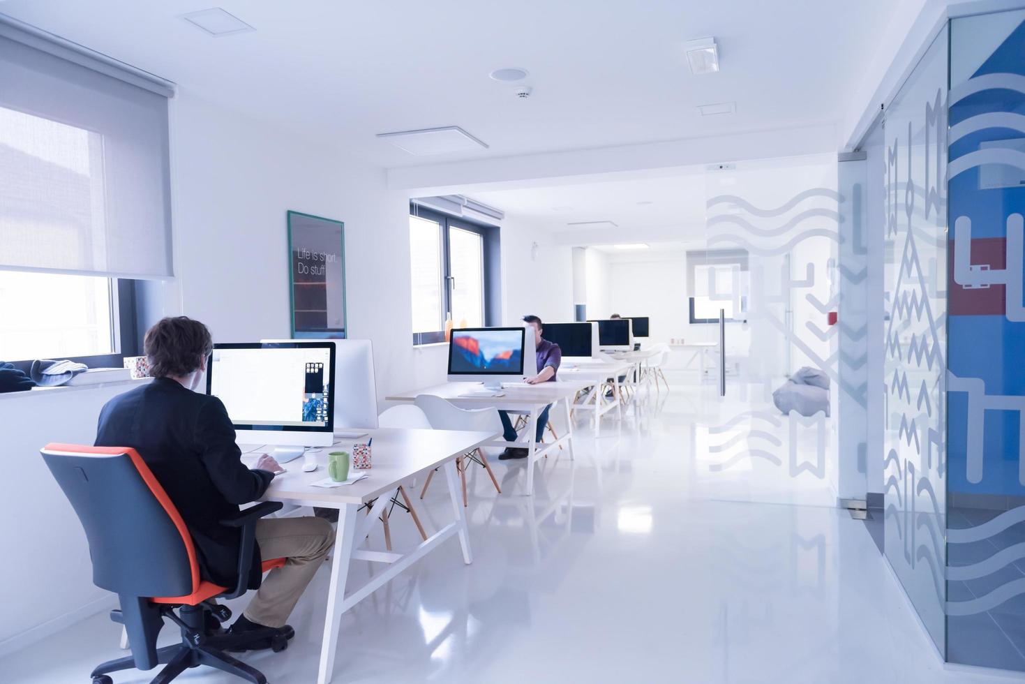 startup business, software developer working on computer photo