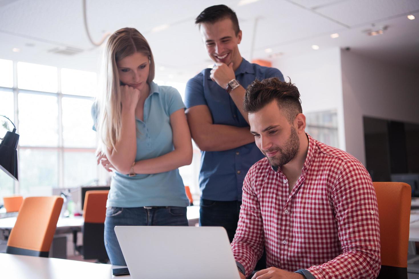 Group of young people employee workers with computer photo