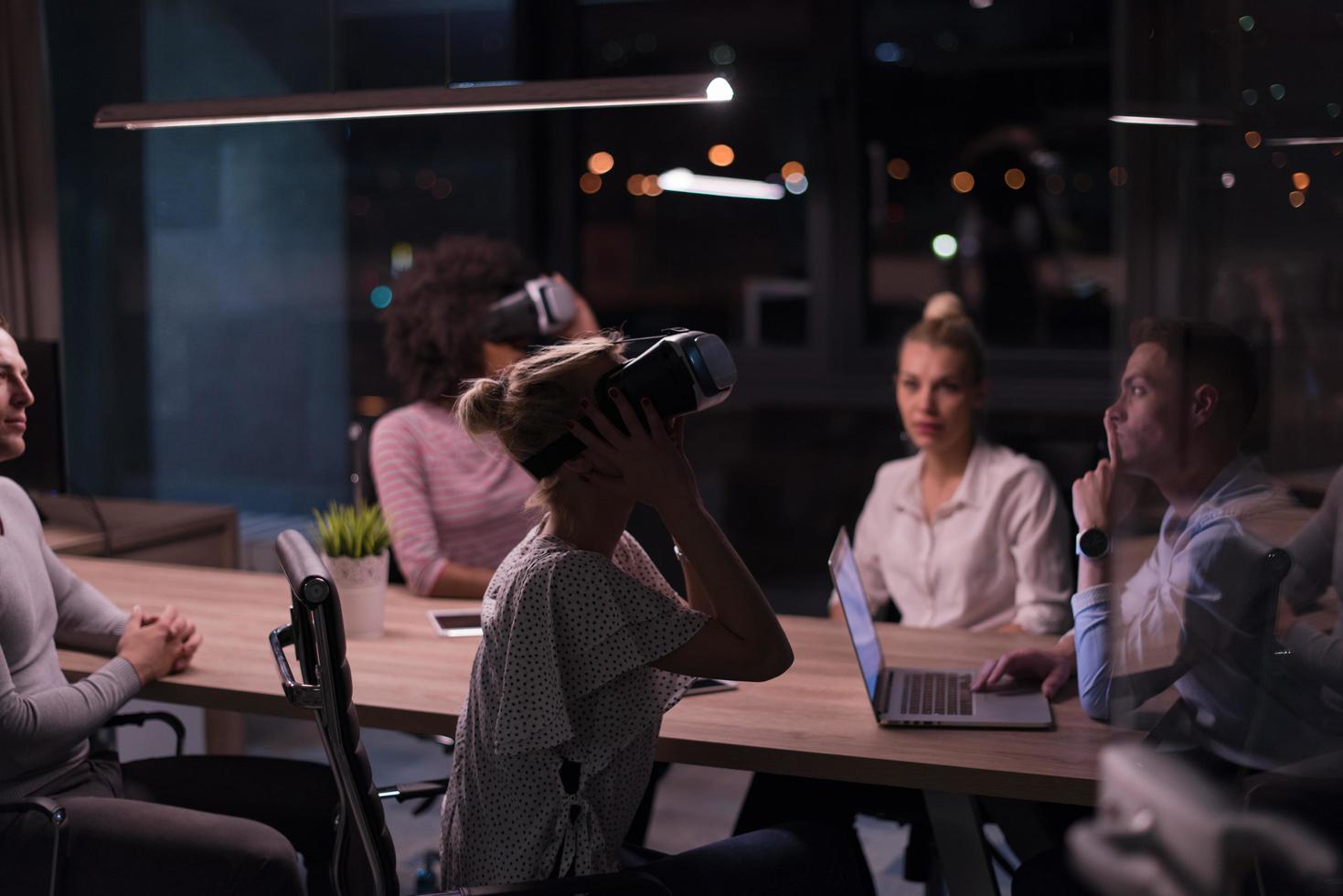 Multiethnic Business team using virtual reality headset photo