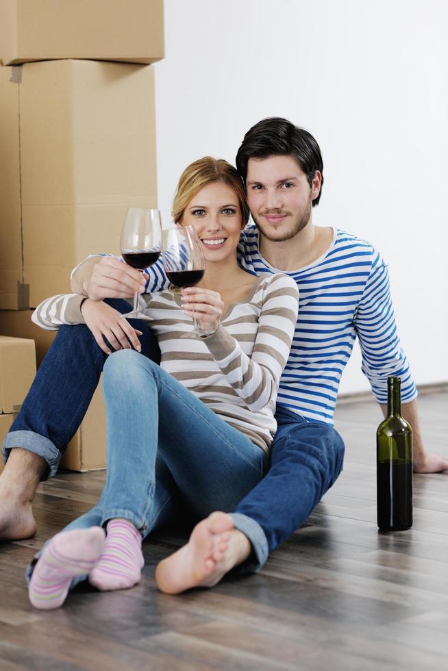 Young couple moving in new house photo