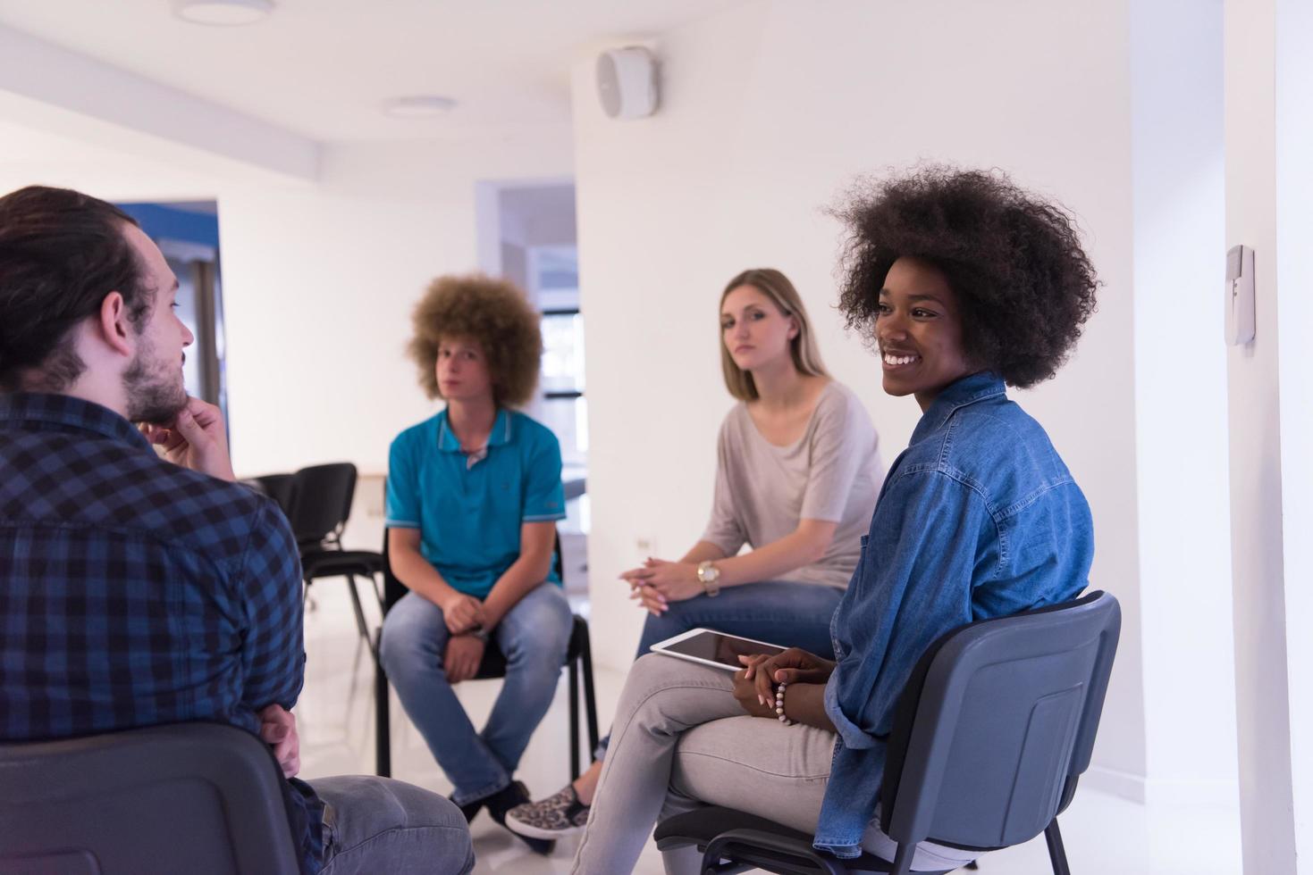 Multiethnic startup business team on meeting photo