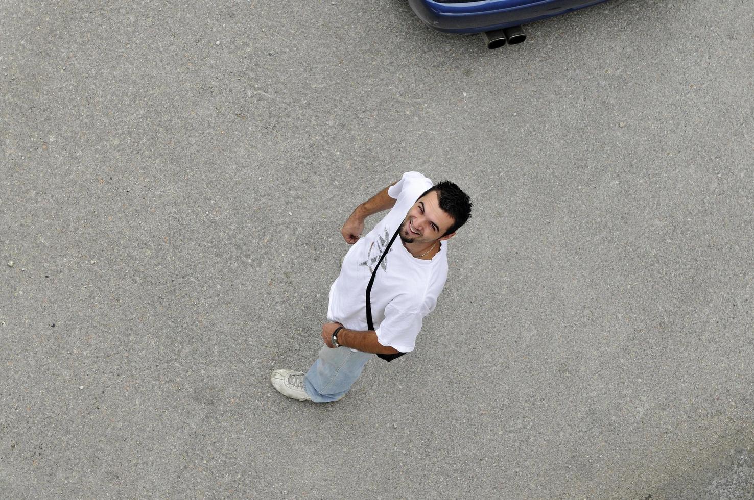 young man looking up photo