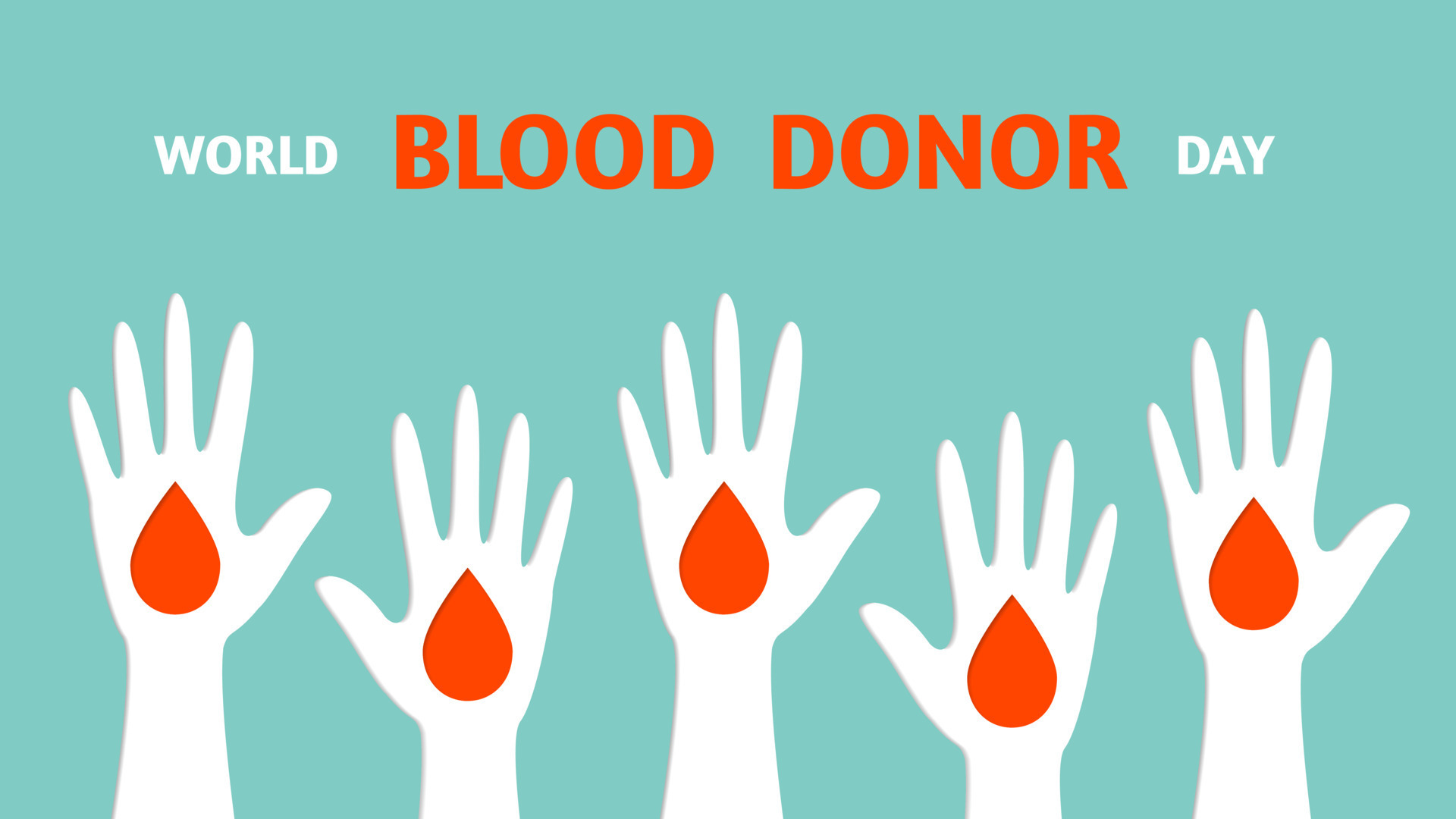 World blood donor day, human hand is raised in front, drop of blood