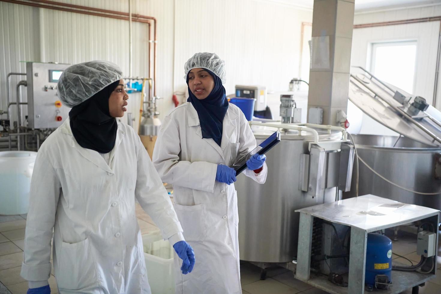 business woman team in local  cheese production company photo