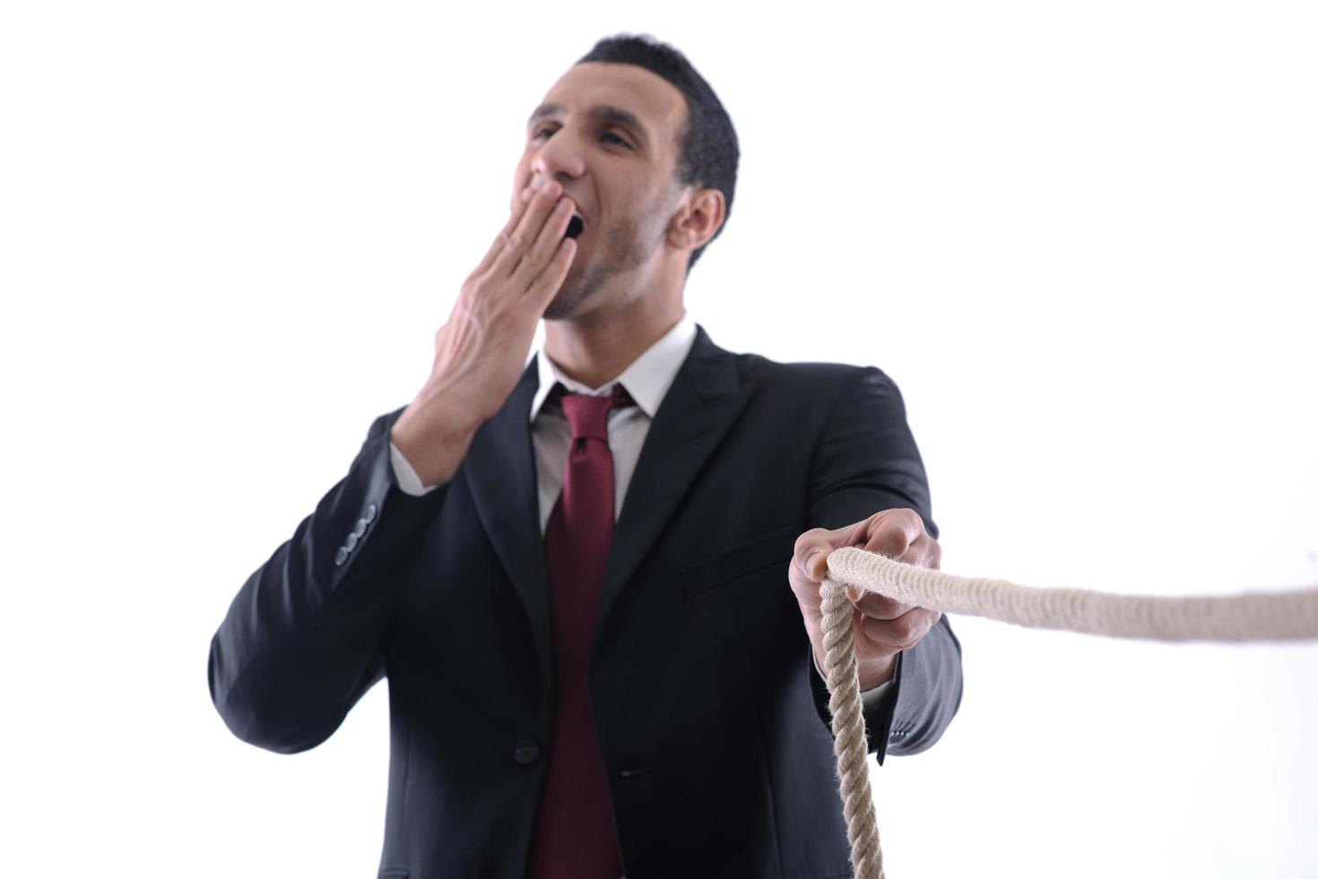 business man with rope isolated on white background photo