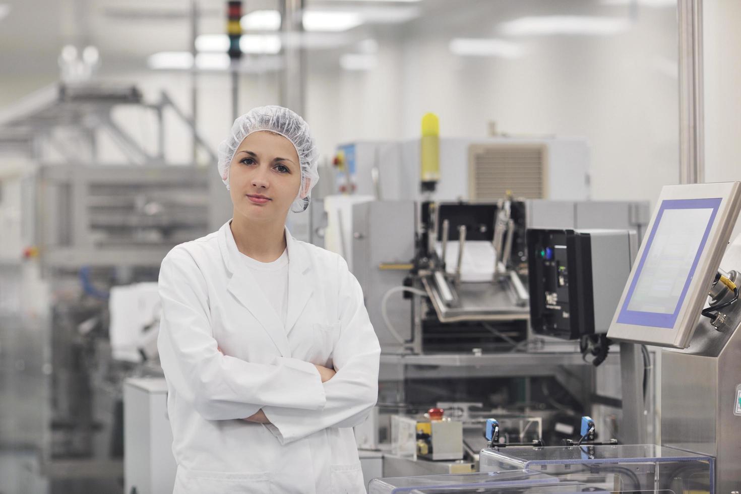 woman worker in pharmacy company photo