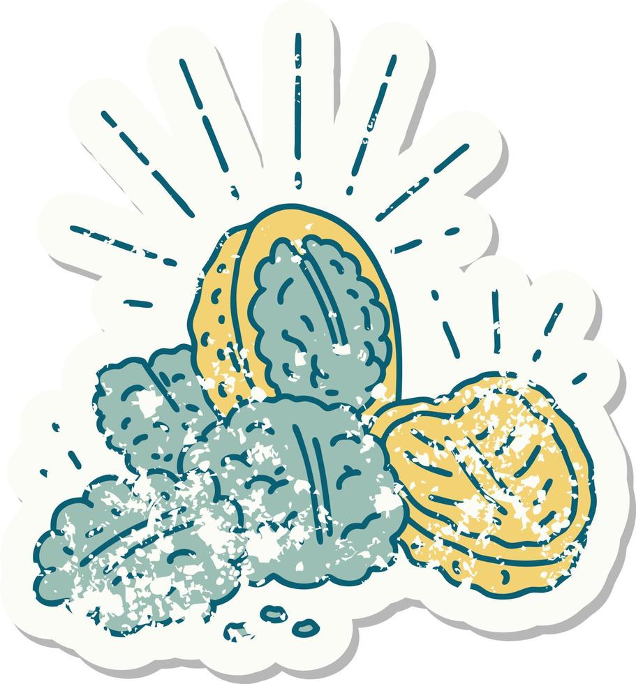 grunge sticker of tattoo style walnuts with shell vector