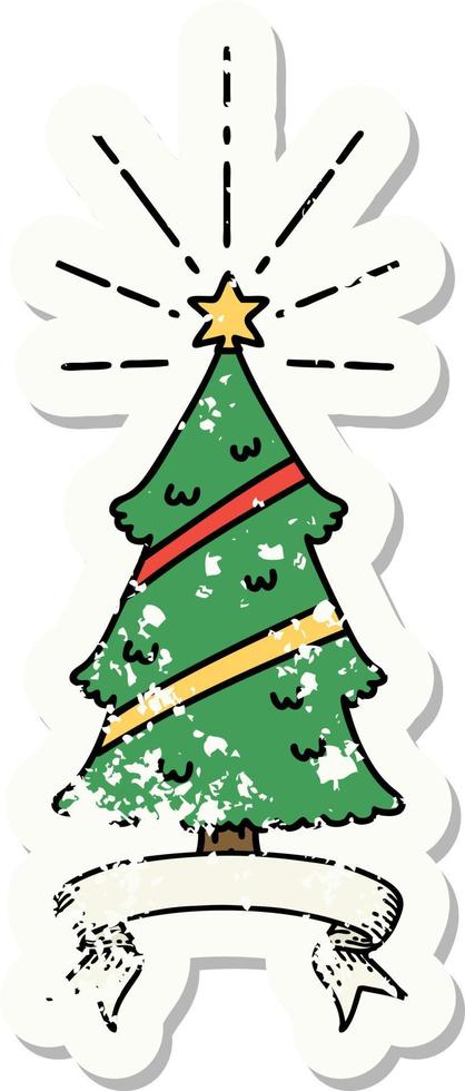 worn old sticker of a tattoo style christmas tree with star vector