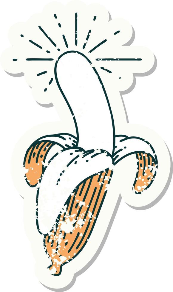 worn old sticker of a tattoo style peeled banana vector