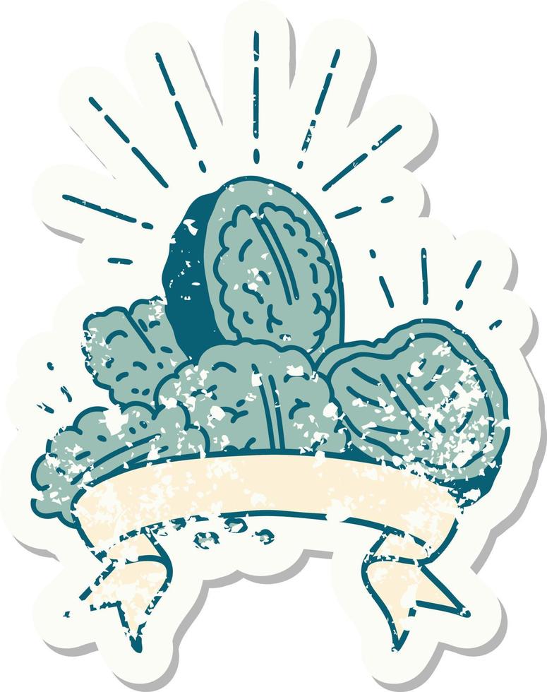 worn old sticker of a tattoo style walnuts with shell vector