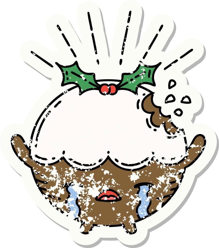 worn old sticker of a tattoo style christmas pudding character crying vector