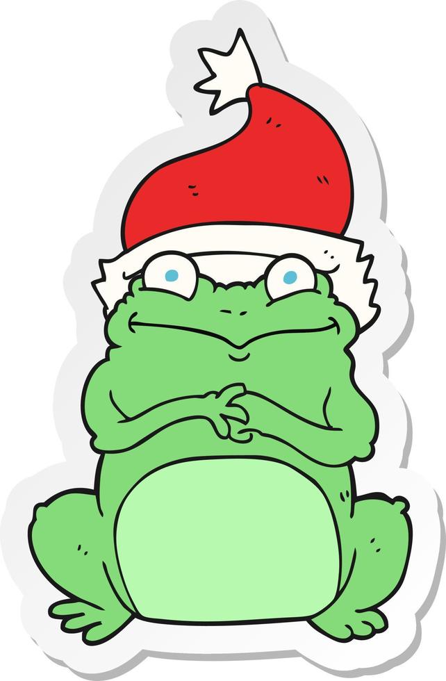 sticker of a cartoon frog wearing christmas hat vector