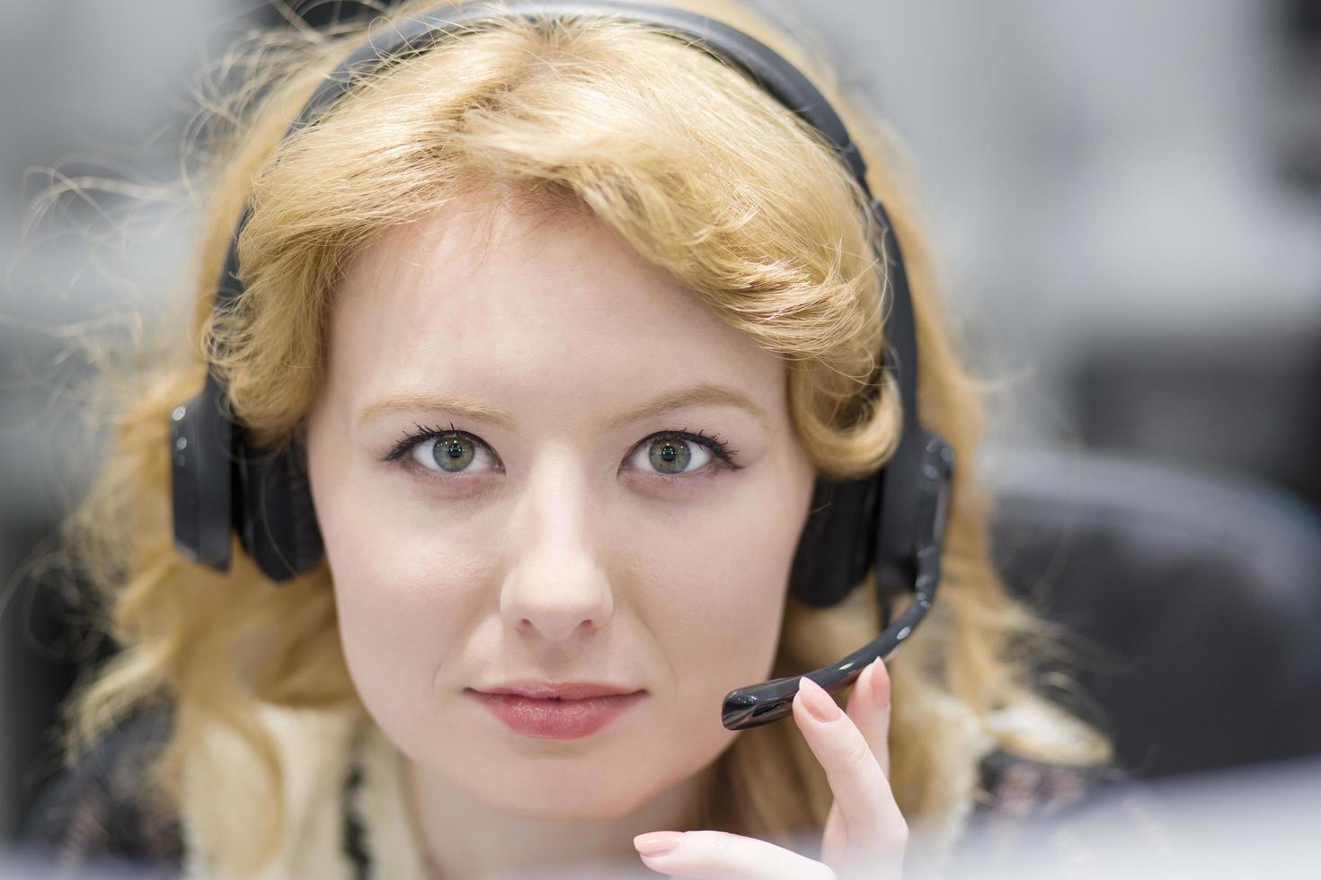 female call centre operator doing her job photo