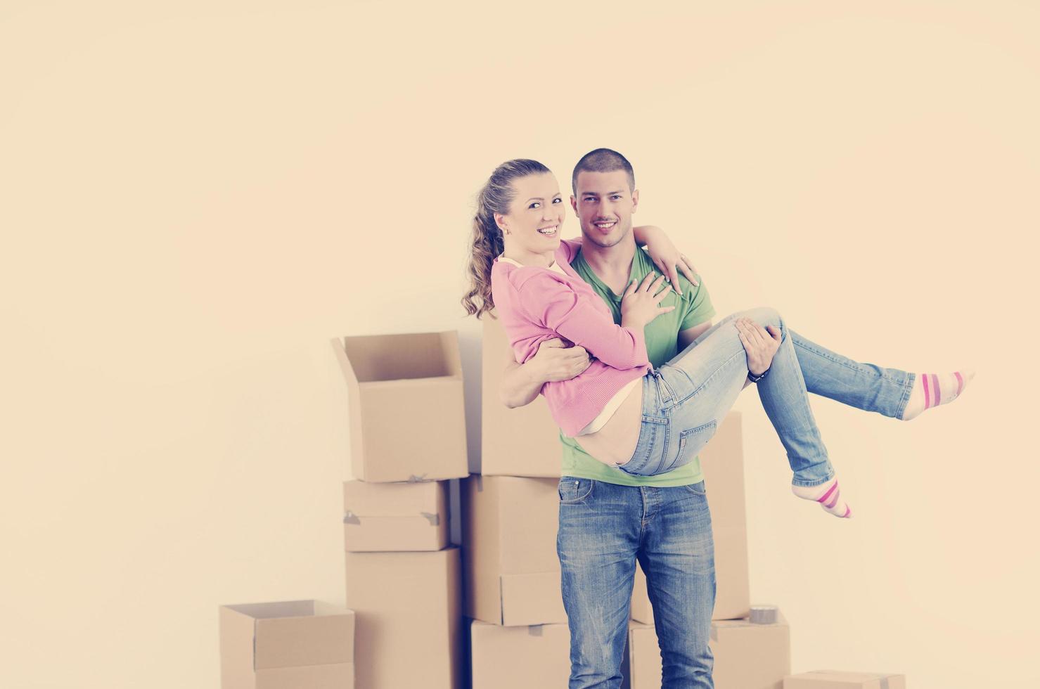 Young couple moving in new home photo