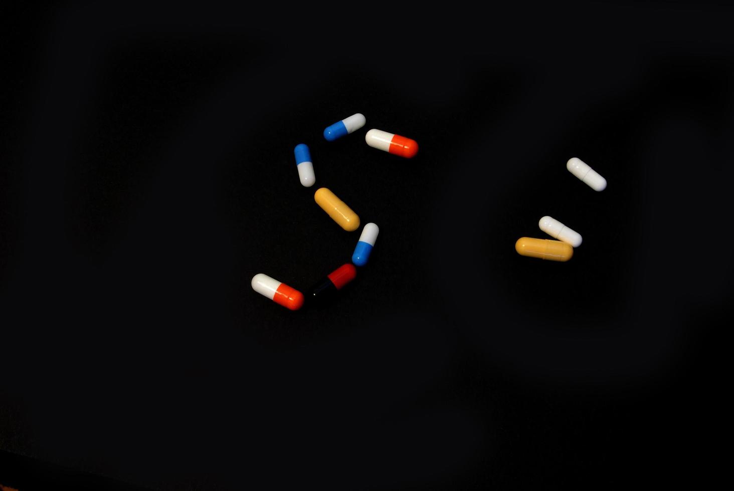 pills on black photo