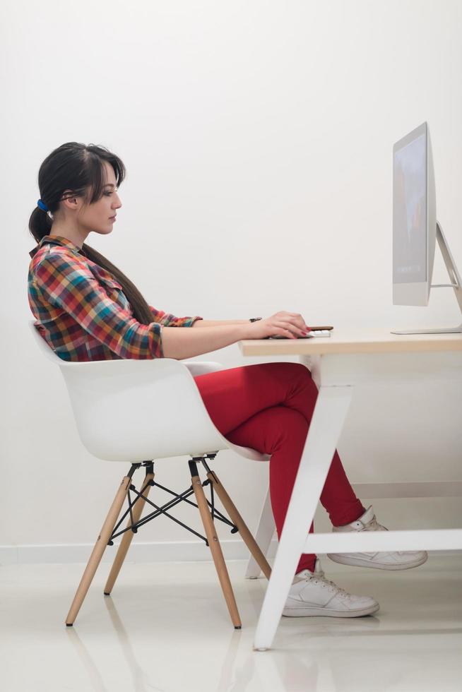 startup business, woman  working on desktop computer photo