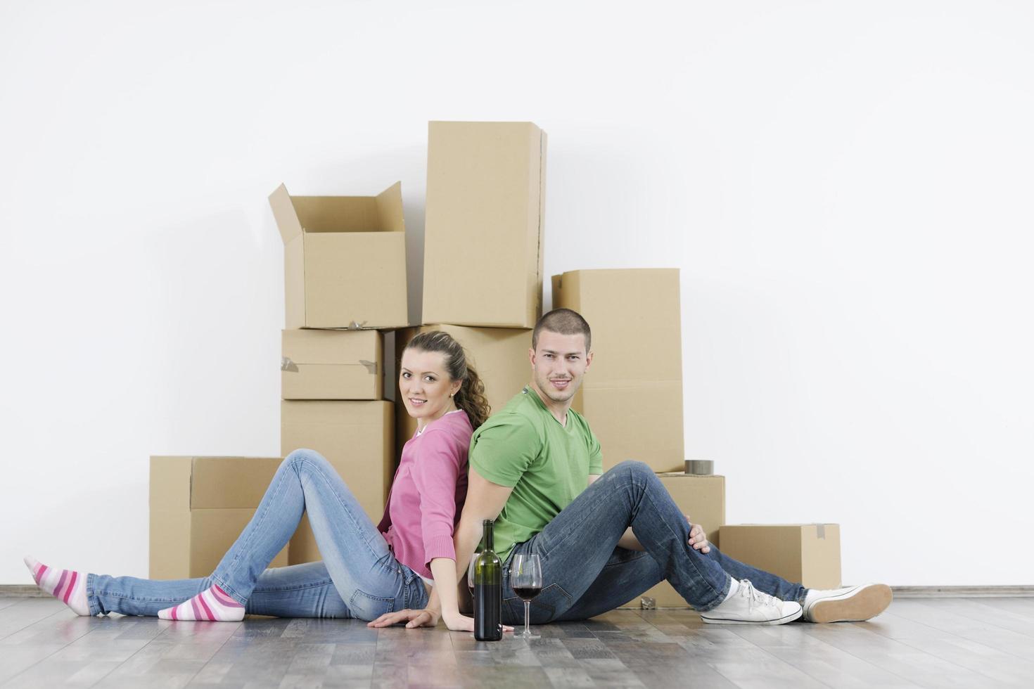 Young couple moving in new home photo