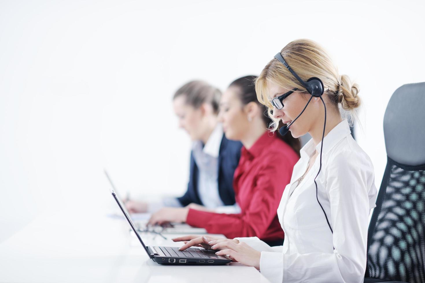 business woman group with headphones photo