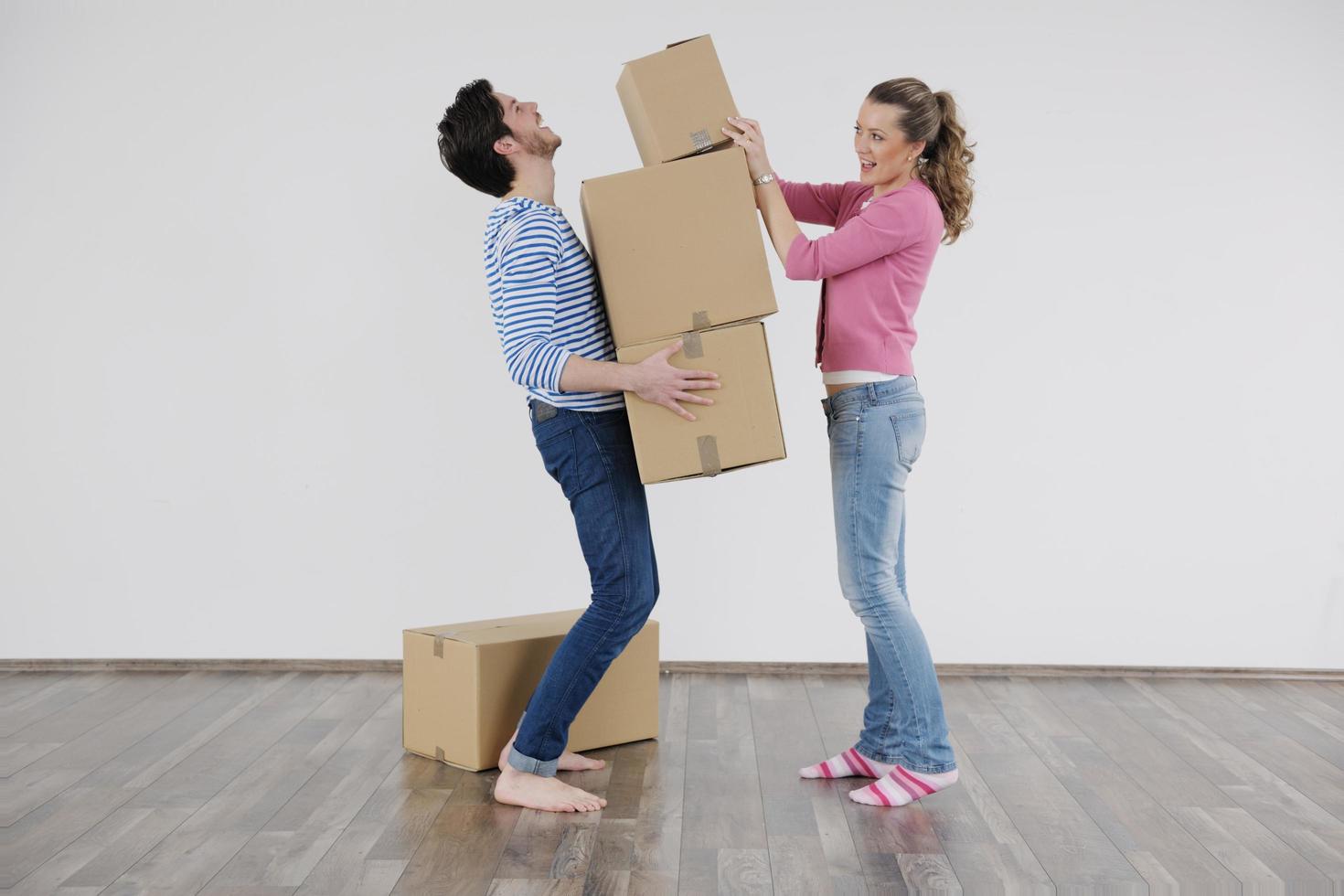 Young couple moving in new house photo